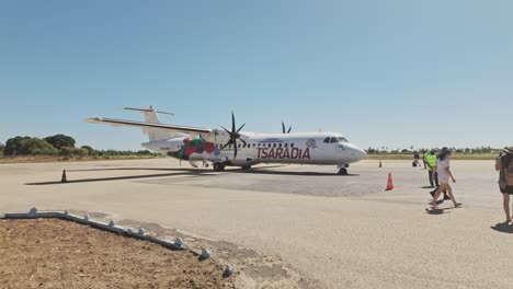 POV:-Small-airplane-TR-72-500-Tsaradia-boarding-passengers-on-Morondava-Airport