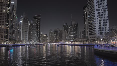 Night-cruise-showcasing-Dubai-Marina's-skyline