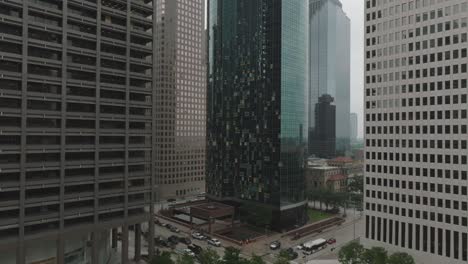 An-aerial-view-of-broken-office-building-windows-caused-by-straight-line-winds,-peaking-at-100-mph,-that-ripped-through-downtown-Houston,-Texas,-on-Friday,-May-16,-2024