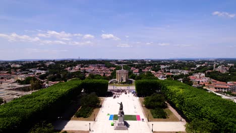 Aerial-establishing-shot-of-school-children-gathering-at-Peyrou-Royal-Square