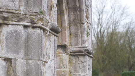 Close-up-of-Old-Mellifont-Abbey's-ancient-stone-texture-in-Tullyallen,-Drogheda,-shot-on-a-vintage-Helios-lens