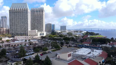 Roucco-Park-in-downtown-San-Diego-with-bay-in-background,-aerial-view