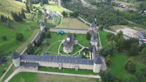 Explore-the-majestic-Sucevița-Monastery,-a-UNESCO-World-Heritage-site,-showcasing-vibrant-frescoes-and-rich-history-in-northern-Romania