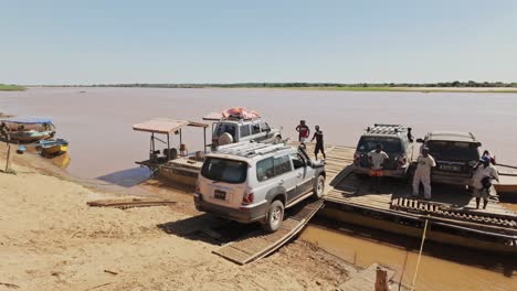 Offroad-4x4-car-loading-into-old-dangerous-ferry-boat-on-the-way-to-Tsingy-De-Bemaraha-National-Park