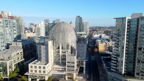San-Diego-Central-Library-in-city-center,-aerial-drone-view-with-skyline