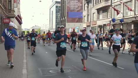 19-may-2024,-Rimi-Riga-Marathon-Latvia:-Marathon-Runners-Crowd-10km-Distance-Front-View