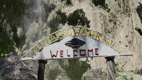 Entrance-gate-welcome-sign-at-the-Tumalog-waterfalls-in-Cebu,-Philippines