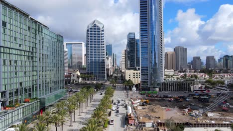 Modern-High-Rises-on-West-Broadway-Street-in-San-Diego,-CA-in-aerial-slide-view