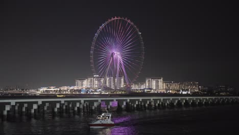 Stunning-night-view-of-Dubai's-Bluewaters-and-illuminated-Ferris-Wheel