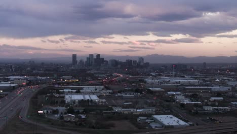 Aerial-footage-of-Denver,-Colorado,-during-dusk-hours,-north-of-Denver-Taken-south-of-Thornton