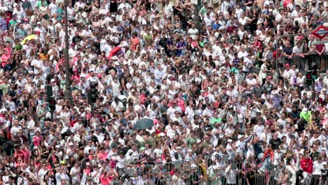 To-celebrate-Real-Madrid's-36th-La-Liga-victory,-thousands-of-fans-gathered-with-the-players-at-Cibeles-Square-in-Madrid,-Spain