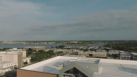 An-aerial-establishing-shot-zooms-out-from-Houston-Methodist-Clear-Lake-Hospital,-Houston-Methodist-Orthopedics-and-Sports-Medicine-and-Medical-Office-Building-4,-on-NASA-Road-1-in-Houston,-Texas