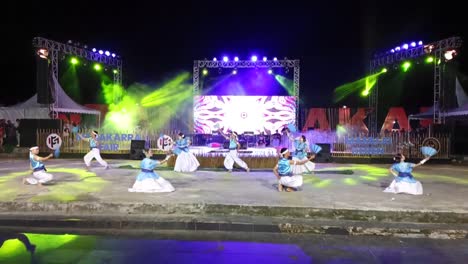 The-Mandar-tribe-dance-performed-at-Manakarra-beach,-Mamuju,-West-Sulawesi,-Indonesia_slow-motion