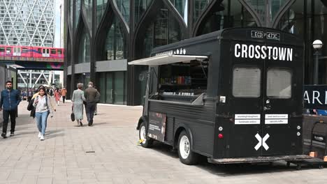 Would-you-like-to-buy-some-food-or-have-a-coffee,-CrossTown,-Canary-Wharf,-London,-United-Kingdom