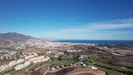 Panorama-of-south-Andalusia-landscape,-Aerial-view-Fuengirola-city-and-blue-sea-water