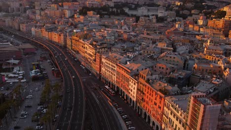 Golden-hour-drone-view-of-Genoa's-historic-center-with-bustling-streets-and-warm-light,-timelapse