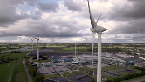 Active-clean-energy-wind-turbines-and-solar-panels-hub-in-The-Netherlands-in-dramatic-weather-conditions-landscape