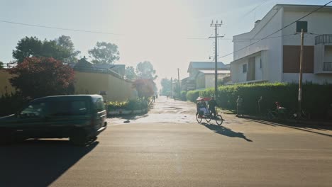 Busy-streets-of-Antsirabe-full-of-people-with-rickshaws-on-sunny-morning