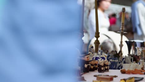 Souvenirs-On-Flea-Market-In-Marché-à-la-Brocante-On-Famous-Street-Cours-Saleya-in-Nice,-France,-Close-up-Shot