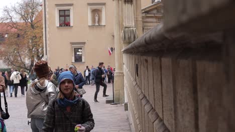 Slow-motion-of-the-children-in-Wawel-Royal-Castle-in-Krakow,-Poland