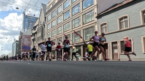 19-may-2024,-Rimi-Riga-Marathon-Latvia:-Marathon-Runners-Crowd-10km-Distance-Front-View