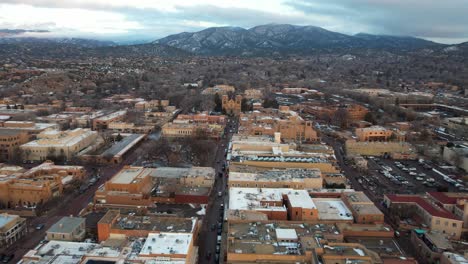 Aerial-View,-Santa-Fe,-New-Mexico-USA-on-Cloudy-Day,-Revealing-Drone-Shot,-Buildings,-Streets-and-Cathedral