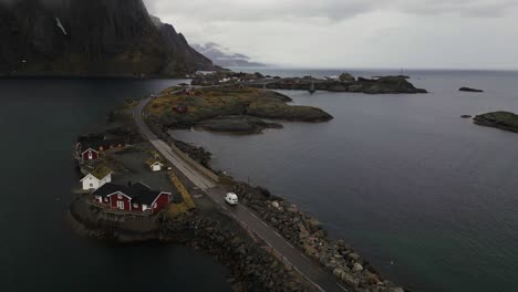 Minivan-drove-across-quite-winding-road-in-Reine-Village