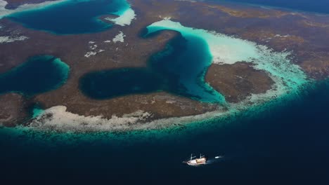 Aerial-view-of-coral-reef-in-Taka-Makassar,-Komodo-National-Park,-Indonesia