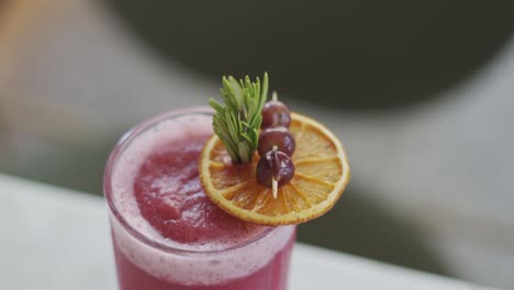 strawberry-juice-with-ingredients-on-wooden-table,close-up-shot,-high-angle-shot