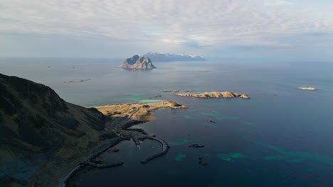 Epic-view-of-hills-sea-and-distance-island-of-Vaeroy,-Norway