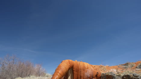 Back-View-of-Woman-in-Pool-With-Geothermal-Water