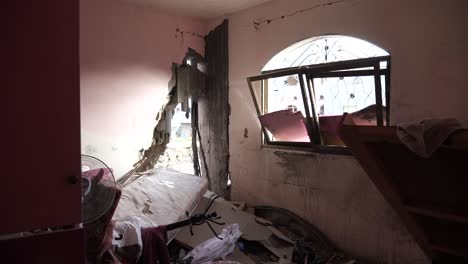 Vandalized-and-abandoned-house-building-of-an-Israeli-family-after-being-bombed-during-the-Israel-Hamas-war-conflict