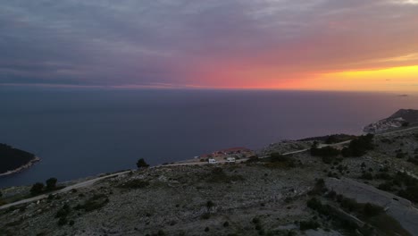 Camper-vans-cars-standing-on-a-slope-above-the-city-of-Dubrovnik-in-Croatia