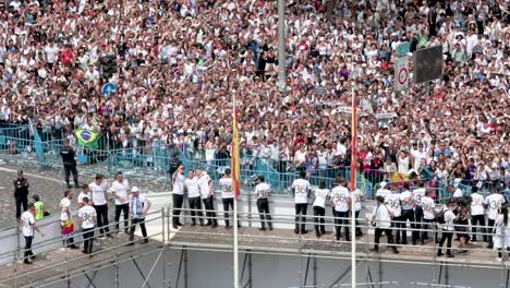 At-Cibeles-Square-in-Madrid,-Real-Madrid-players-celebrate-winning-their-36th-La-Liga-title-with-thousands-of-fans