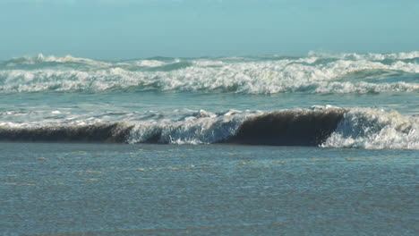 Sea-Waves-Receding-On-Beach-Creating-Backwash
