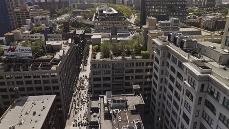 NYC-New-York-Aerial-v410-birds-eye-view-fly-around-the-iconic-clock-tower-condominium-in-Dumbo-Brooklyn,-tilt-up-reveals-Manhattan-bridge-over-East-river---Shot-with-Mavic-3-Pro-Cine---September-2023