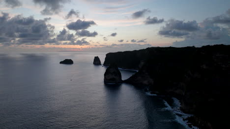 High-cliffs-of-Nusa-Penida-at-sunset,-Bali-in-Indonesia