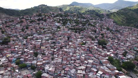 Aerial-view-of-slum-District-in-Medellin-City-with-crowded-old-houses-and-homes-in-Colombia