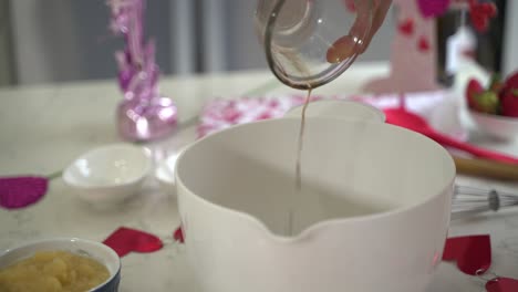 Nice-shot-of-coffee-being-added-to-a-bowl-of-flour-making-a-special-valentine's-day-cake-vegan-chocolate-cake-eggless-plant-based-dairy-free