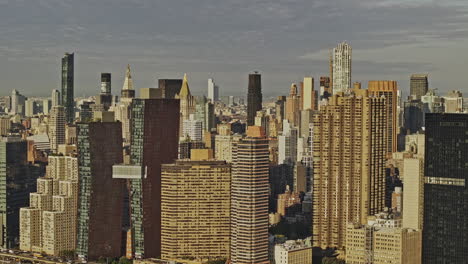 NYC-New-York-Aerial-v393-flyover-capturing-Murray-Hill-and-Kips-Bay-neighborhoods-and-populous-cityscape-across-Midtown-and-Lower-Manhattan-at-sunrise---Shot-with-Mavic-3-Pro-Cine---September-2023