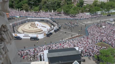 Thousands-of-Real-Madrid-fans-gather-at-Cibeles-Square-to-celebrate-with-Real-Madrid-players-the-36th-Spanish-soccer-league-title,-La-Liga-cup-in-Madrid,-Spain