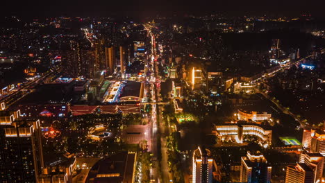 Vista-De-Pájaro-De-La-Concurrida-Calle-De-Los-Rascacielos-De-Negocios-De-Manhattan-Horizonte-De-La-Ciudad-De-Nueva-York-Por-La-Noche,-Disparo-De-Drones-En-ángulo-Alto