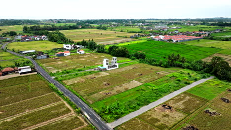 Imposing-large-white-building-structure-erected-middle-of-Balinese-nature