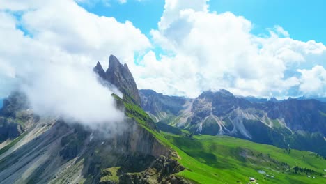 View-from-above,-stunning-aerial-view-of-the-mountain-range-of-Seceda-during-a-cloudy-day