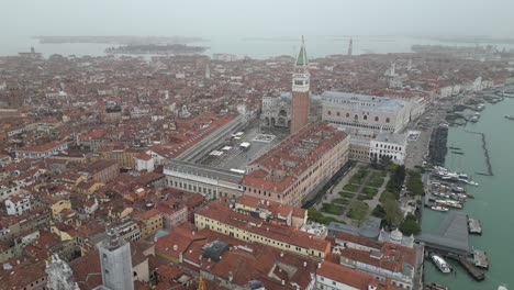 Venice-Italy-downtown-busy-city-square-aerial-on-foggy-day