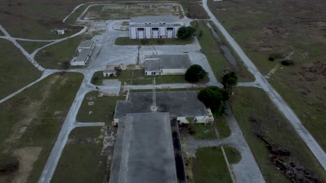 Aerial-reveal-of-abandoned-military-base-and-Voice-of-America-radio-station-headquarters-in-Greece