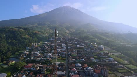Beautiful-township-situated-on-hillside-of-Mount-Sumbing,-aerial-view