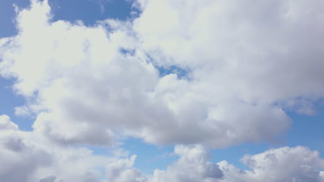 Fluffy-Clouds-Above-the-Vastness-of-the-Scottish-Highlands---Tilt-Down