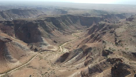 Drone-aerial-expanding-and-zooming-out-over-Charles-knife-gorge