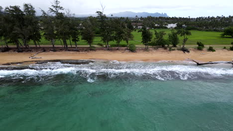 Aerial-Zoom-Away-from-Moody-Kauai-Beach